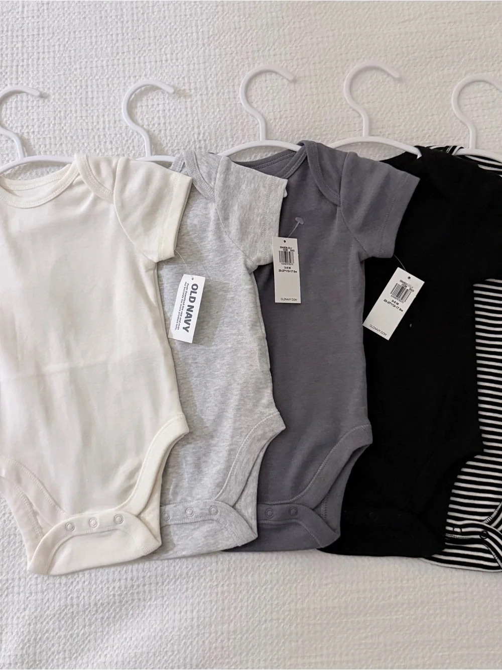 Old Navy 5-Pack Baby One-Piece Bodysuits in Cream, Light Gray, Charcoal, & Black